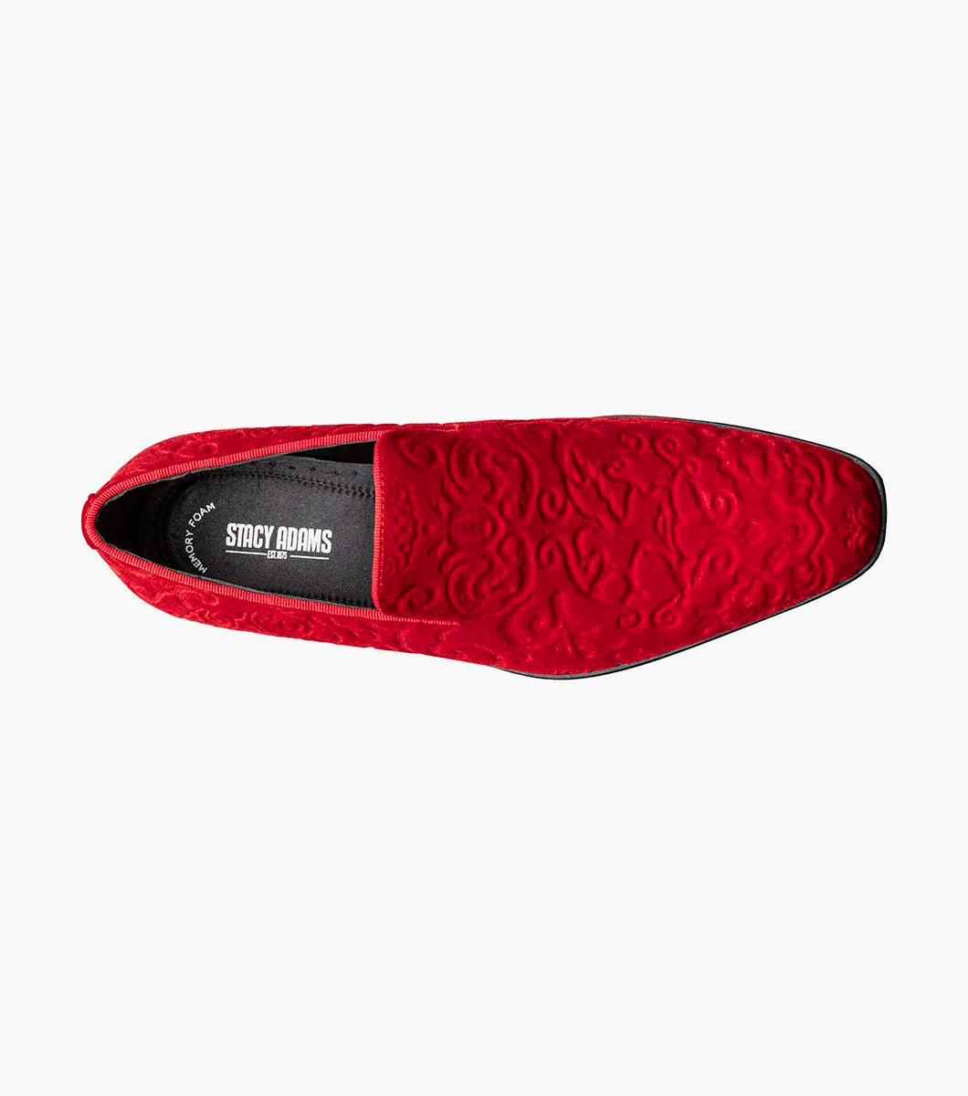 The Stacy Adams Saunders Debossed Velour Slip On in red (25581-600) features swirling embossed patterns, a black sole, and a cushioned insole for comfort.