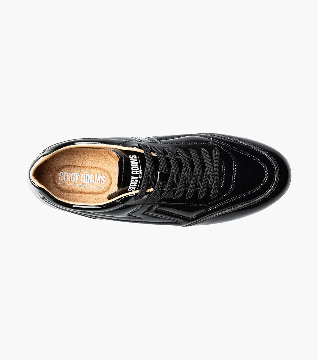 The STACY ADAMS Action 150 Sporty Lace Up in Black Patent (25797-004) features black laces, a white sole, and decorative stitching—presented on a white background for a sleek modern update to men’s casual footwear with a sporty lace-up design.