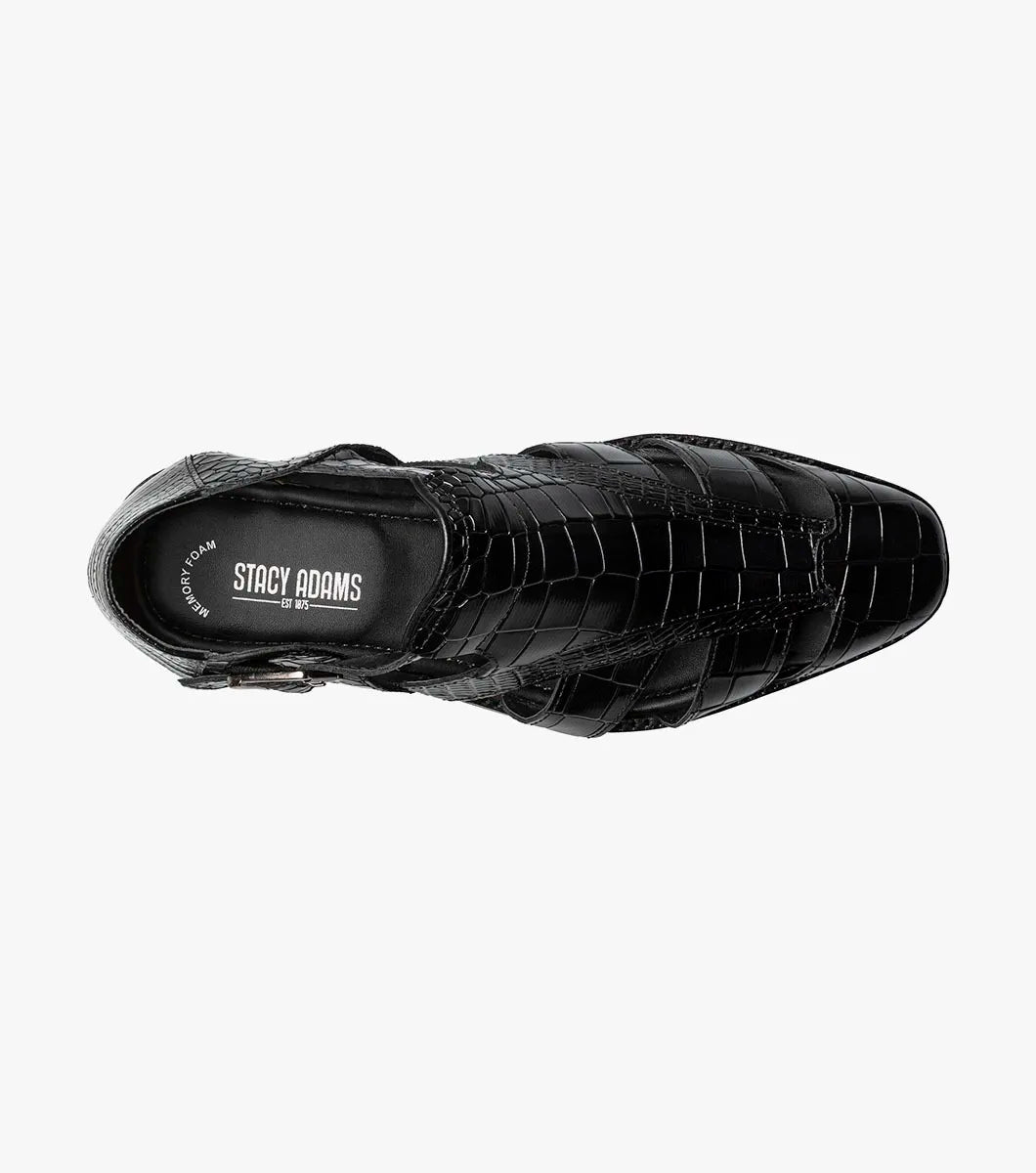 The STACY ADAMS Calandro City Sandal (25695-001) in black features sustainable microfiber with a crocodile texture, side cutouts, closed toe, low heel, and a metal buckle strap.