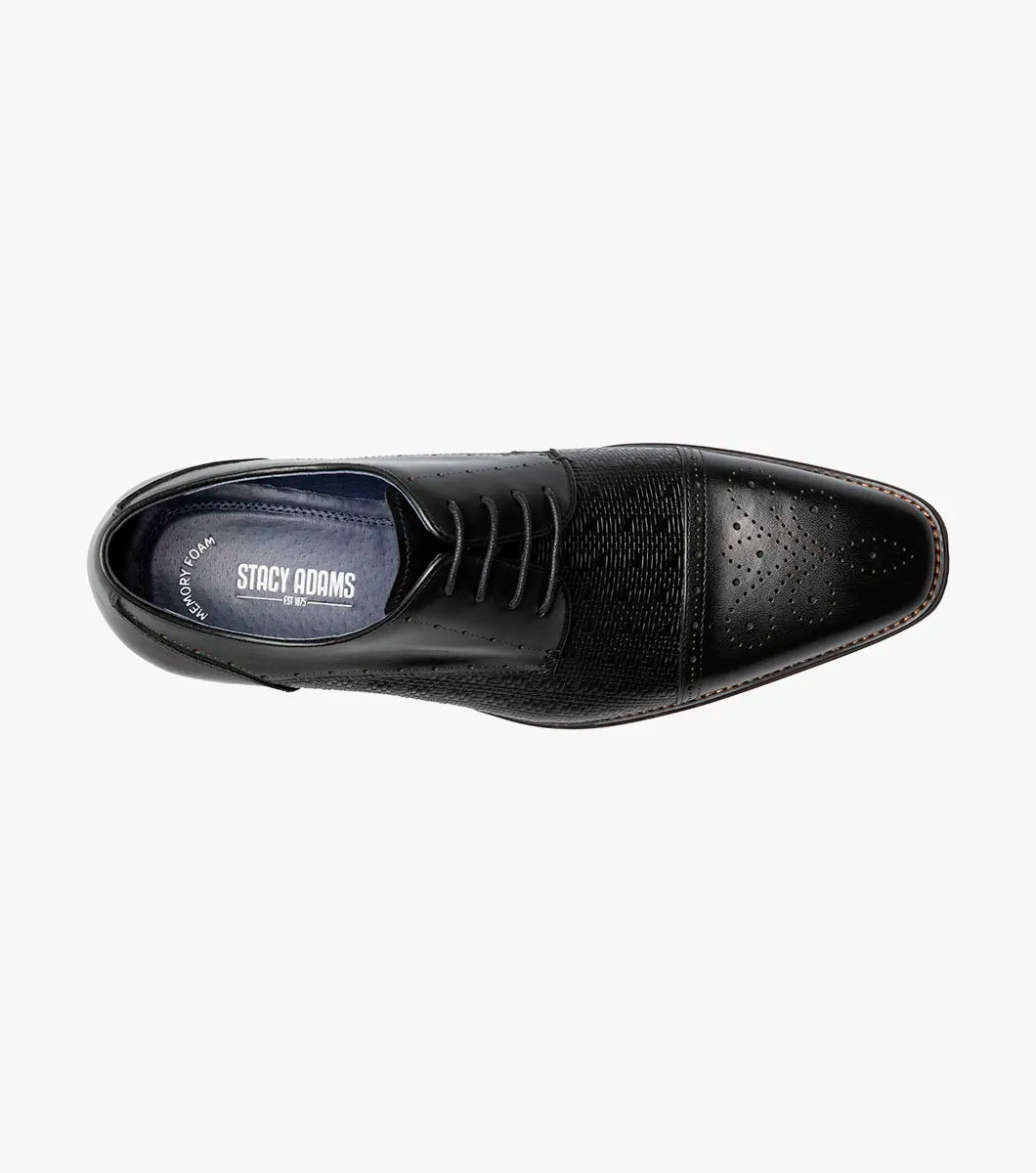 The Stacy Adams Silsbury Cap Toe Oxford in black features a leather upper with textured pattern, wooden heel, elegant perforated detailing, and a Memory Foam footbed for comfort. Style code: 25675-001.