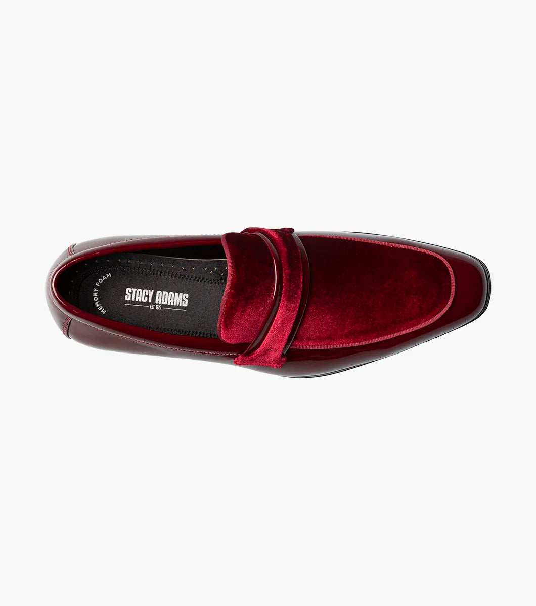 The STACY ADAMS Spratley Moc Toe Saddle Slip On (Burgundy, 25686-601) is a men's loafer with a low heel, combining a velour upper, suede vamp, and glossy patent leather finish.