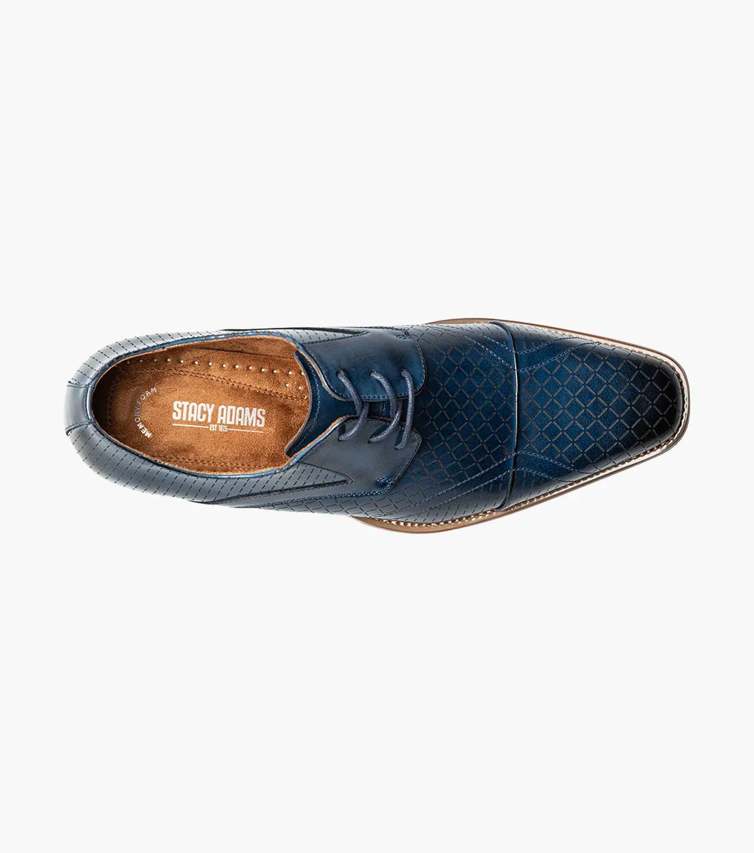 The Stacy Adams Hobson Cap Toe Oxford (25764-400) is a single blue dress shoe with a laser-etched diamond calf leather pattern, lace-up closure, brown sole, and sleek pointed toe.