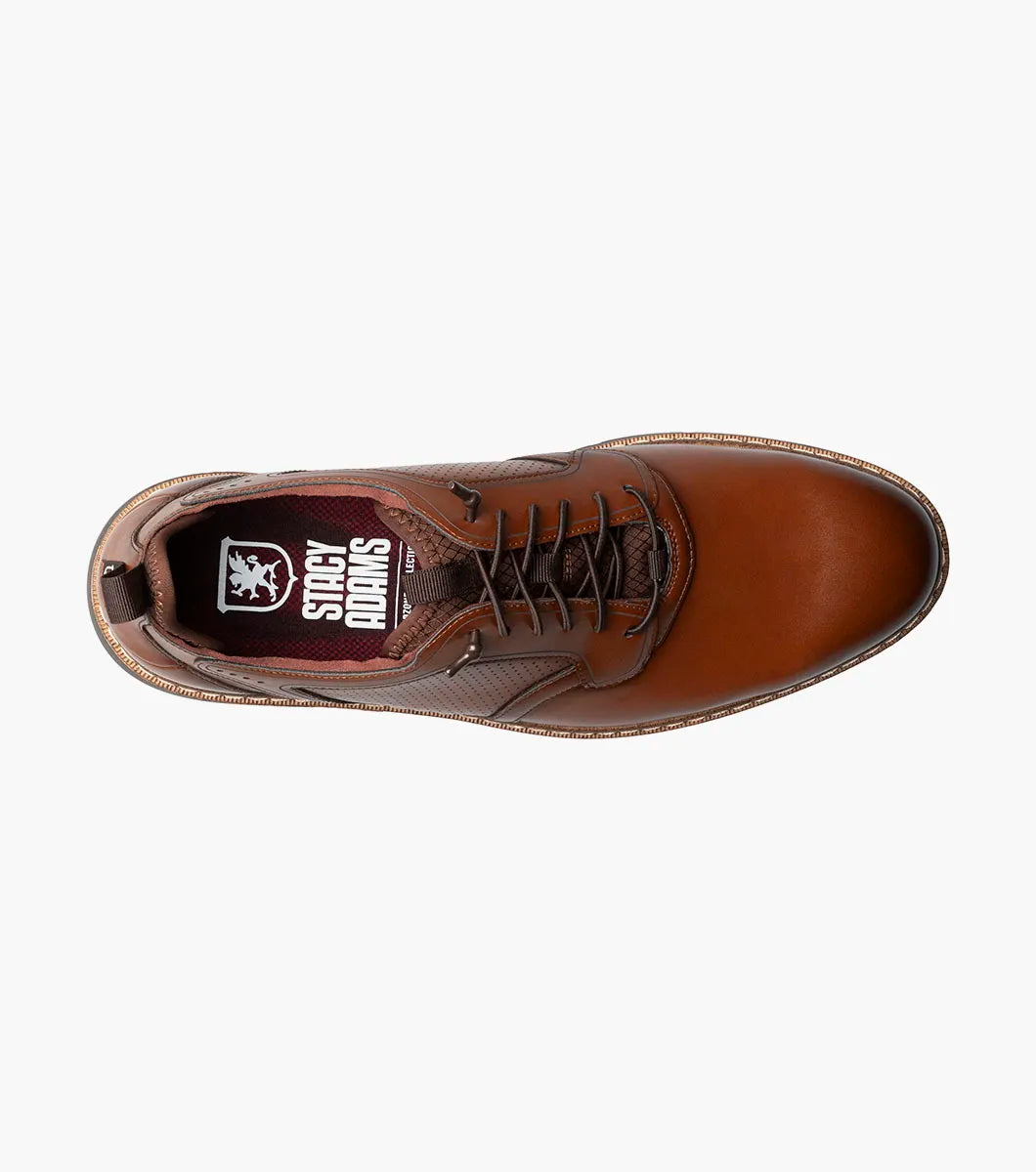 A single Stacy Adams Score Plain Toe Elastic Lace Up dress shoe in Cognac Smooth leather, featuring a textured side panel and a comfortable RedZone footbed, is shown at an angle on a white background.
