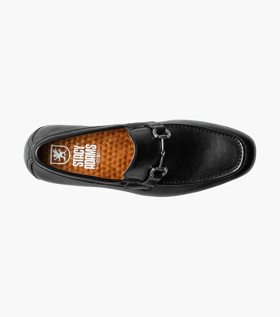 The STACY ADAMS Richmont Moc Toe Bit Slip On in Black Tumbled (21567-007) features black leather, a metal bit detail, low heel, and brown lining—shown here as a stylish dress casual loafer on a white background.