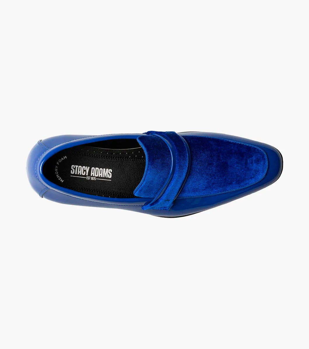 The STACY ADAMS Spratley Moc Toe Saddle Slip On in Royal (25686-432) features a shiny blue velour upper with a patent leather finish, shown in a side profile on a white background.