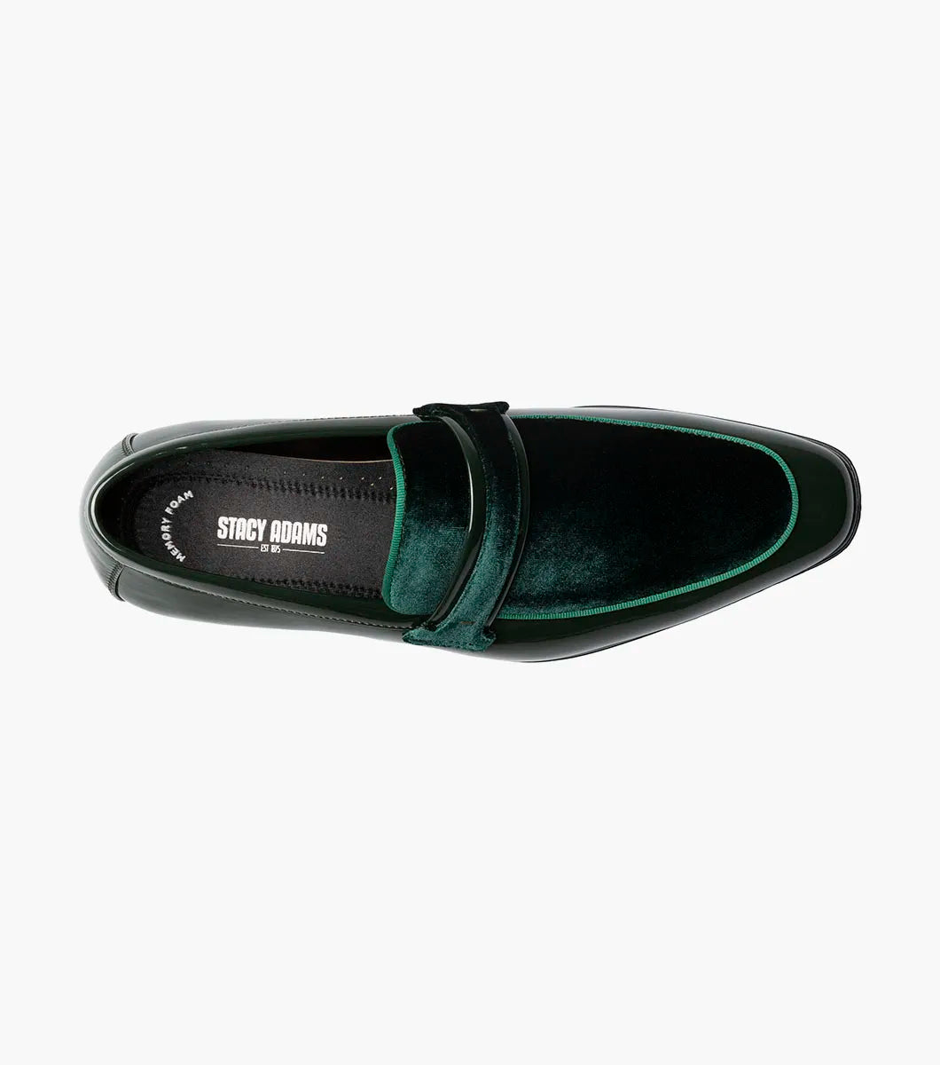 The Stacy Adams Spratley Moc Toe Saddle Slip On in dark green patent leather features a black sole, elegant velour upper, and velvet accents along the upper and tongue.