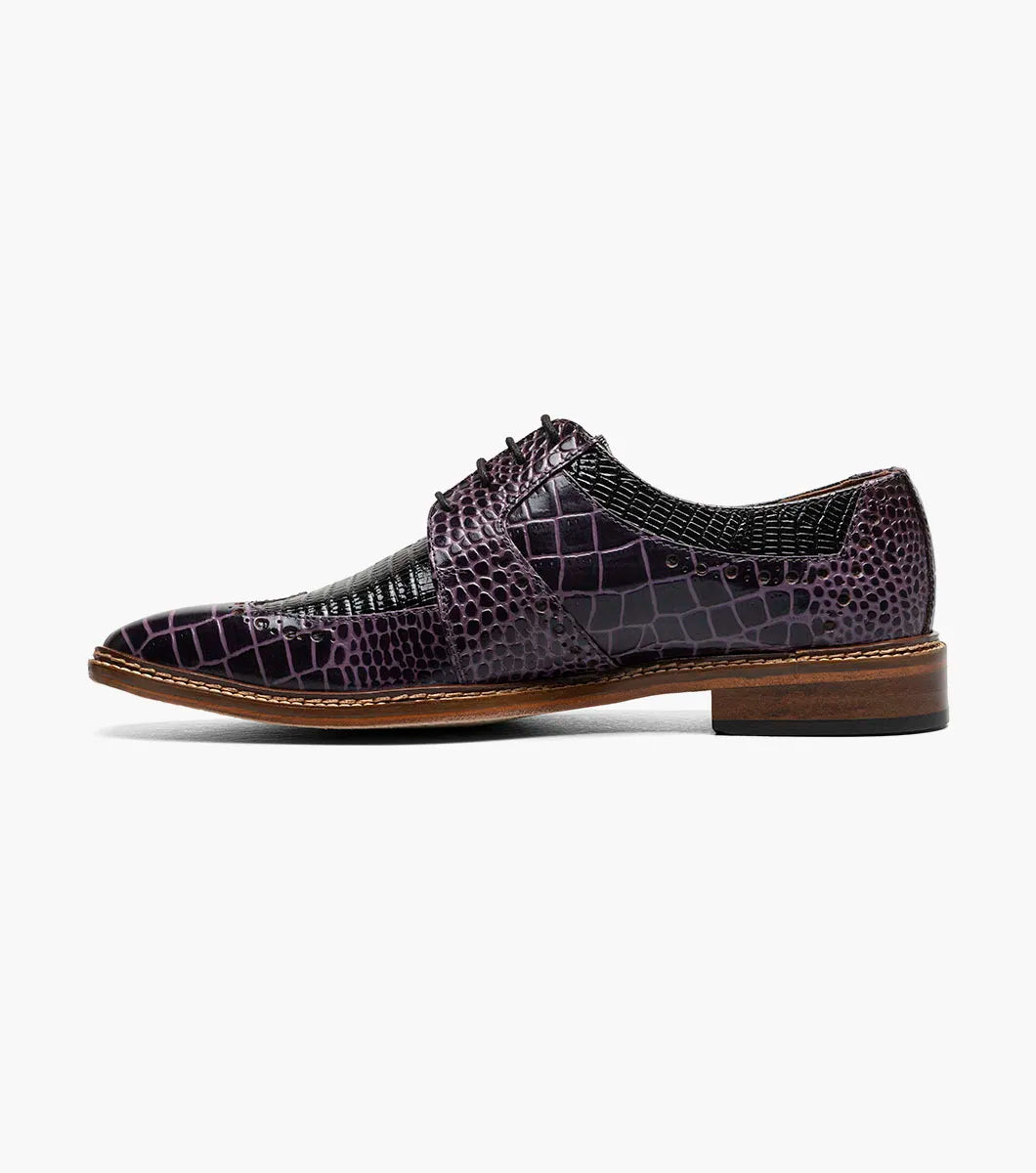A single STACY ADAMS Travato Wingtip Oxford (Purple Multi, 25737-540) men’s dress shoe with a brown sole and lace-up closure is shown on a white background.