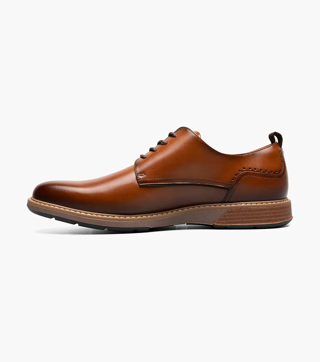 The Stacy Adams Pacer Plain Toe Oxford in Cognac (25754-221) is shown on a white background—its classic lace-up design and low heel make it ideal for both dress casual and formal occasions.