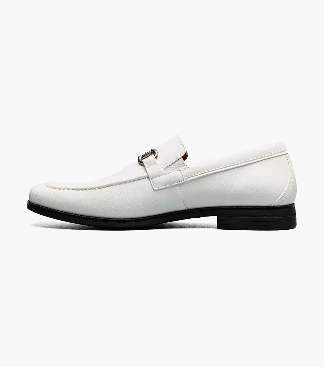 Step up your style with the STACY ADAMS Richmont Moc Toe Bit Slip On in White Tumbled (21567-117), featuring a sleek silver bit, black sole, and tan lining—classic leather loafers perfect for any dress occasion. Displayed on a white background.