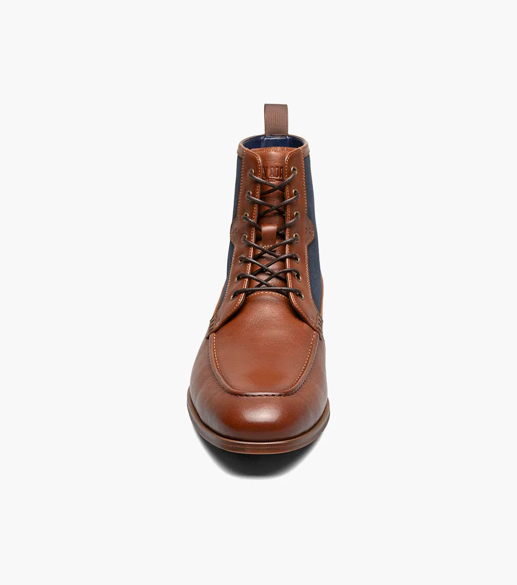 The STACY ADAMS Brumley Moc Toe Lace Up Boot in Tan Multi features burnished leather and navy fabric, a low wooden heel, cushioned footbed, and fabric pull tab.