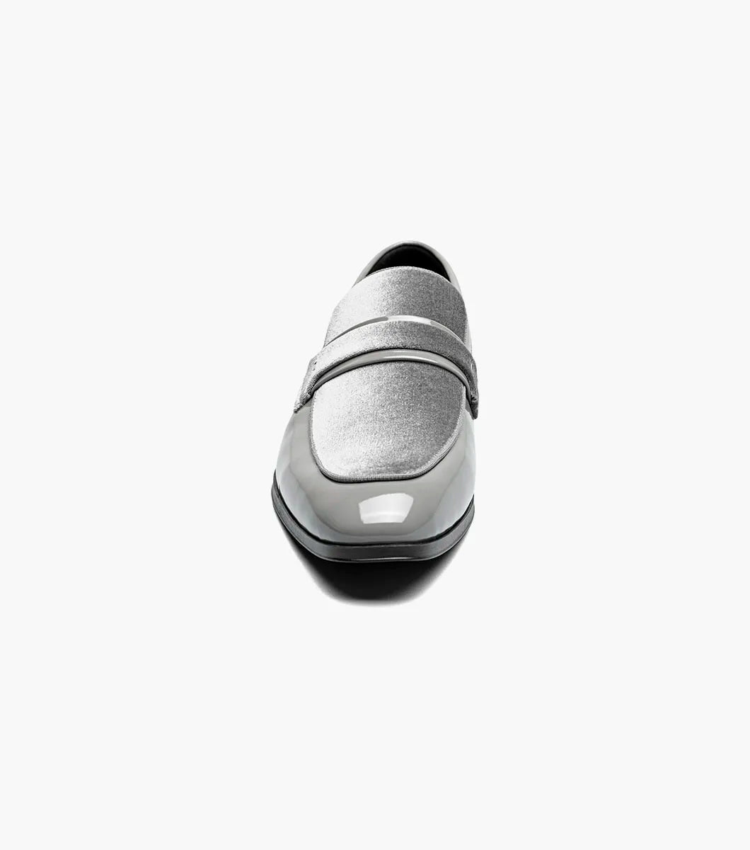 The STACY ADAMS Spratley Moc Toe Saddle Slip On in gray (25686-020) features a velour upper with a shiny patent finish, moc toe slip-on design, low heel, and rounded toe.