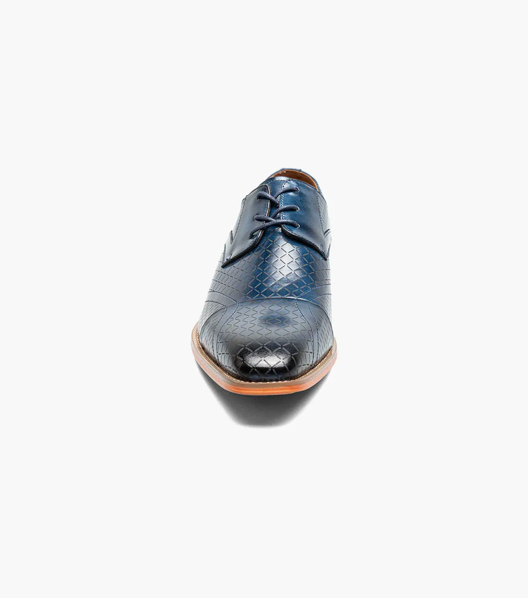 The Stacy Adams Hobson Cap Toe Oxford (25764-400) is a single blue dress shoe with a laser-etched diamond calf leather pattern, lace-up closure, brown sole, and sleek pointed toe.