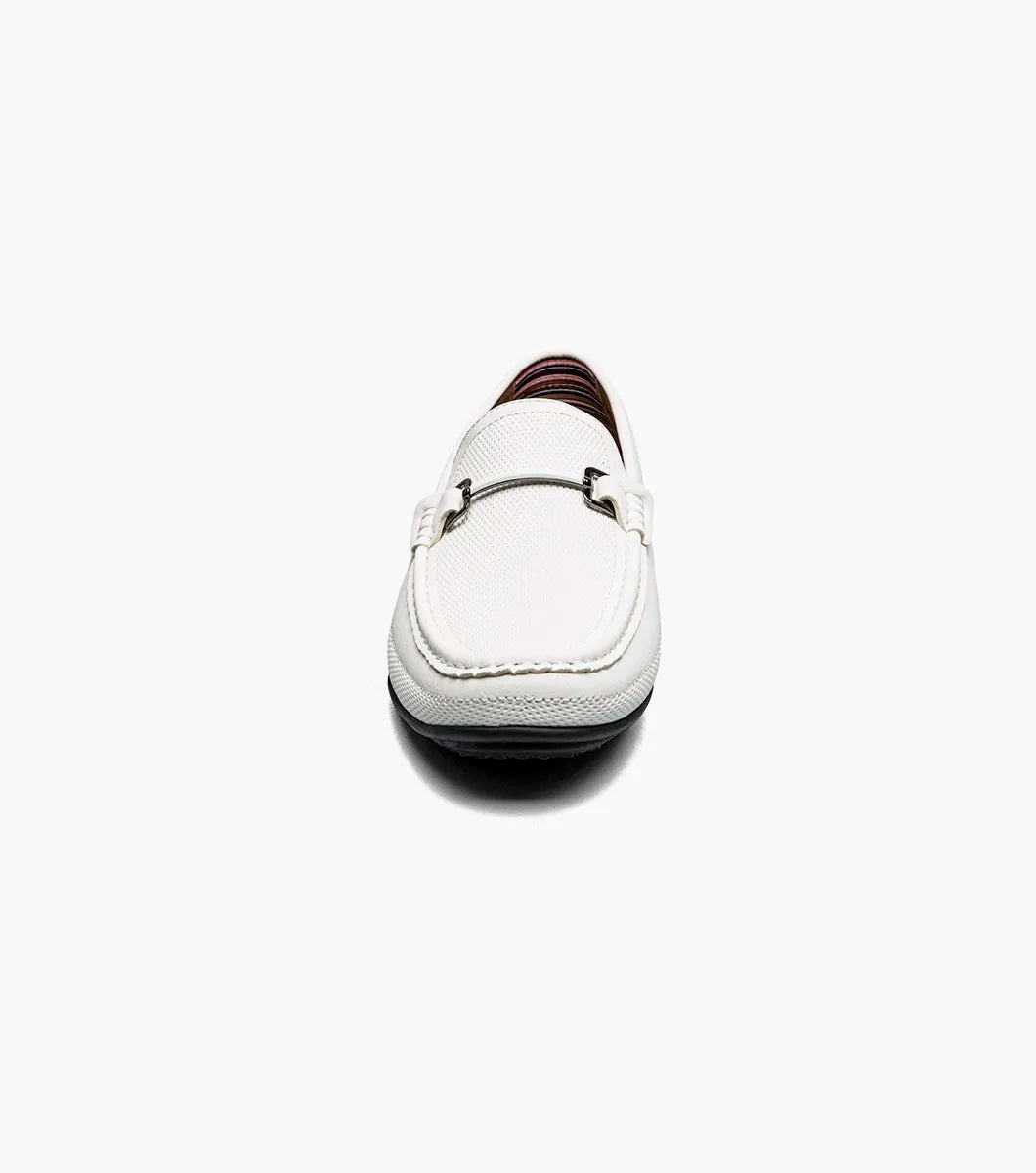 The STACY ADAMS Colton Moc Toe Bit Slip On (White, 25760-100) is a men's leather loafer with a silver bit detail, black sole, patterned heel lining, and cushioned footbed for all-day comfort.