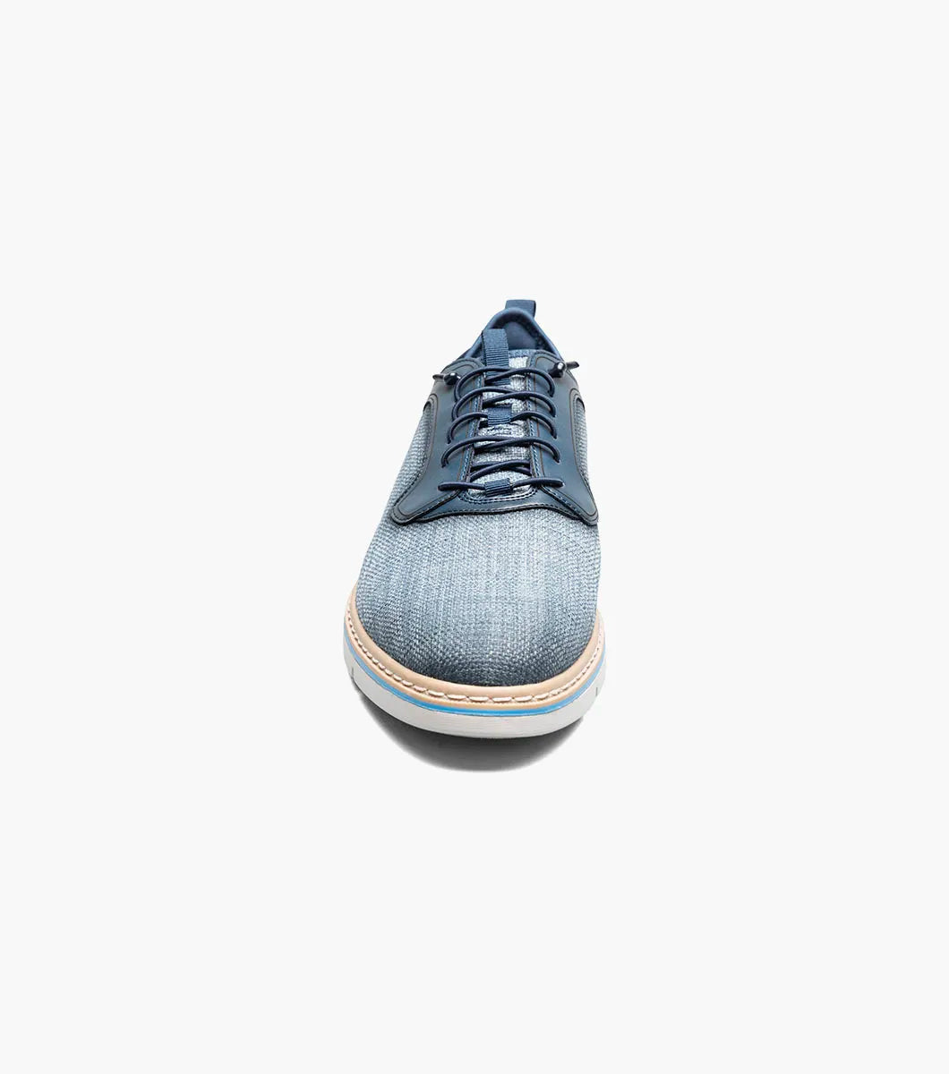 The Stacy Adams Sebert Plain Toe Elastic Lace Up in Navy (25771-410) features a textured upper, smooth leather accents, and a light rubber sole—offering stylish comfort for men. Shown on a plain white background.