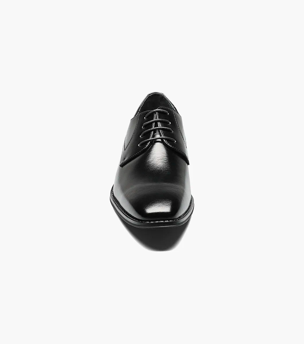 The STACY ADAMS Wayde Plain Toe Oxford (Black, 20144-001) is a leather lace-up dress shoe with a low heel, cushioned footbed, and polished finish, shown here on a plain white background.