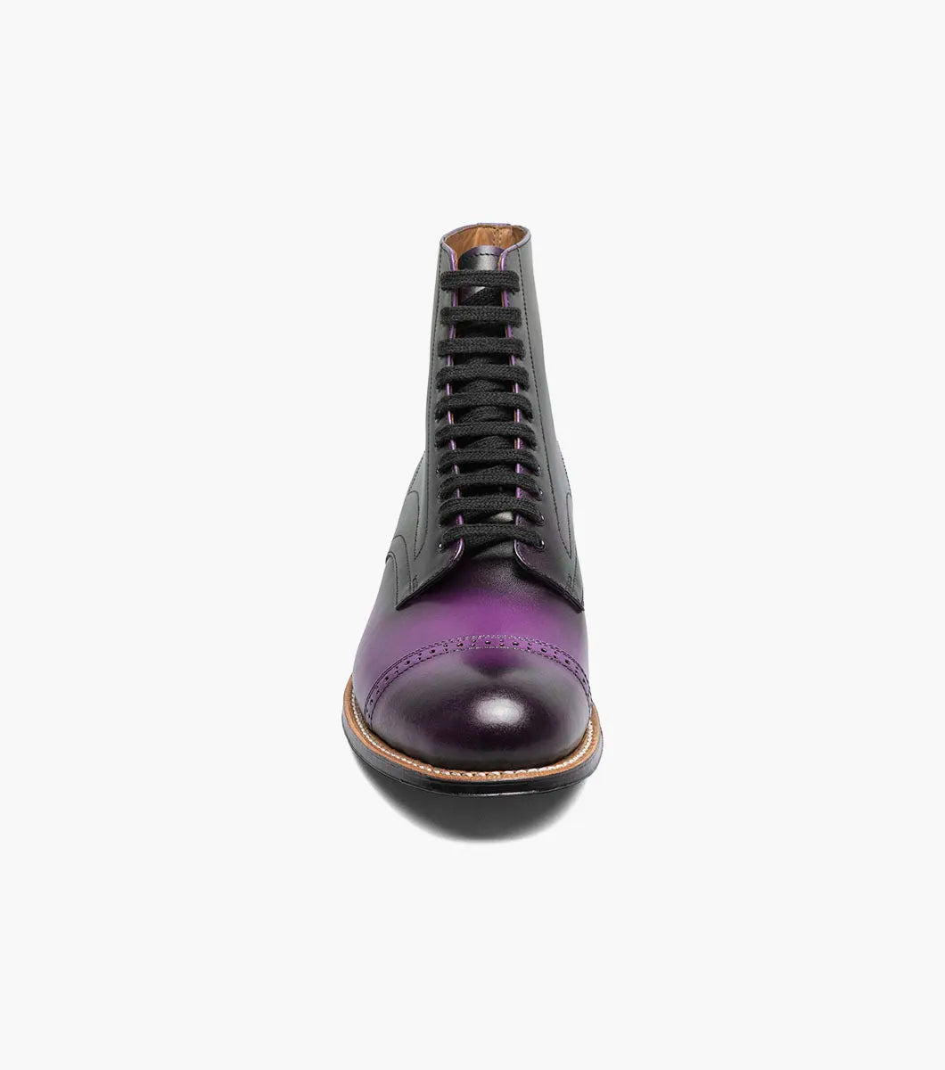 A single STACY ADAMS Madison Cap Toe Lace Up Boot in purple (00110-542) with black laces and brogue detailing is displayed on a plain white background.