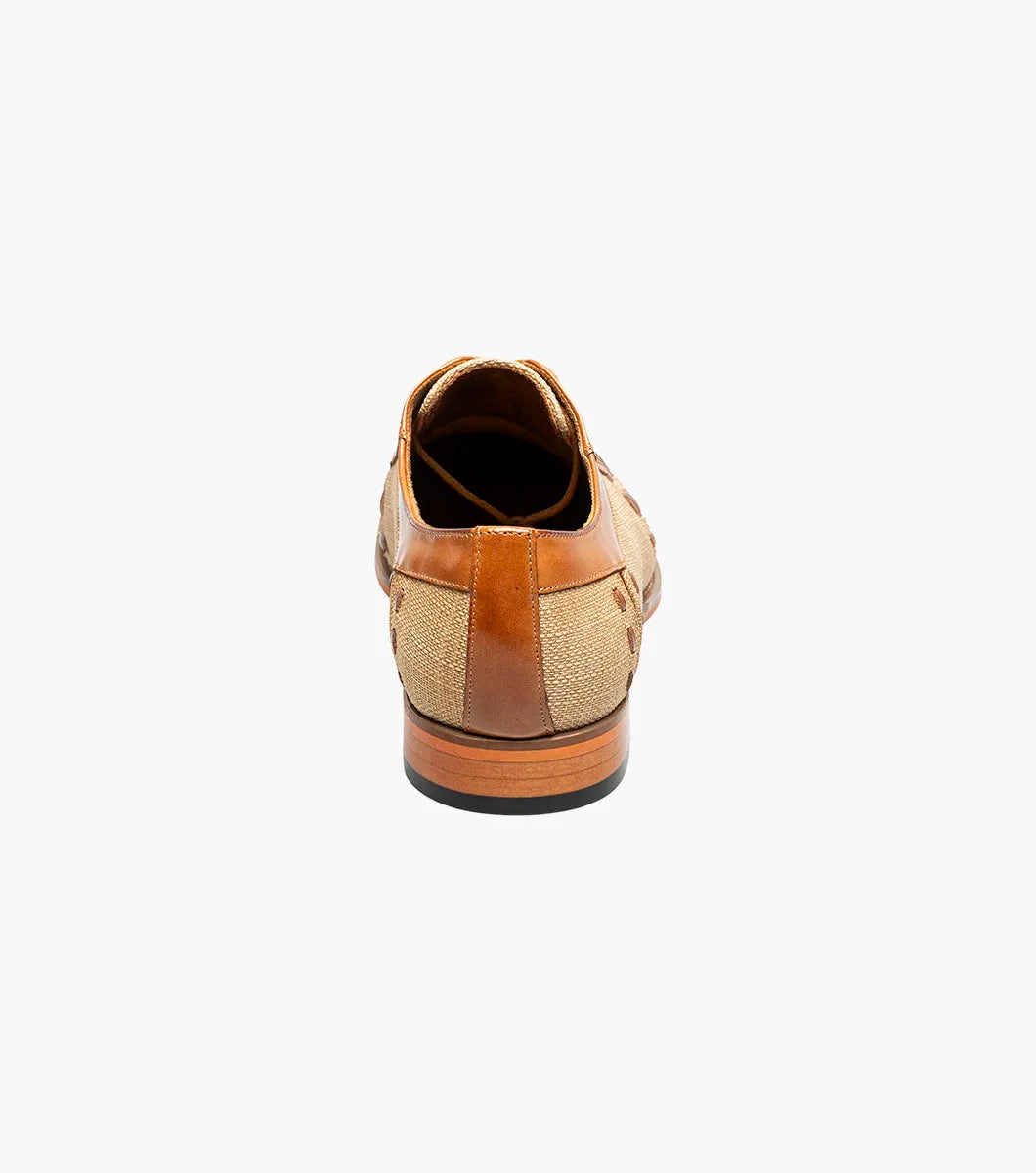 The Stacy Adams Halstead Cap Toe Oxford (Tan Multi, 25765-238) features tan calf leather, beige fabric with a lattice cutout upper, brown laces, and a Memory Foam footbed—shown on a white background.