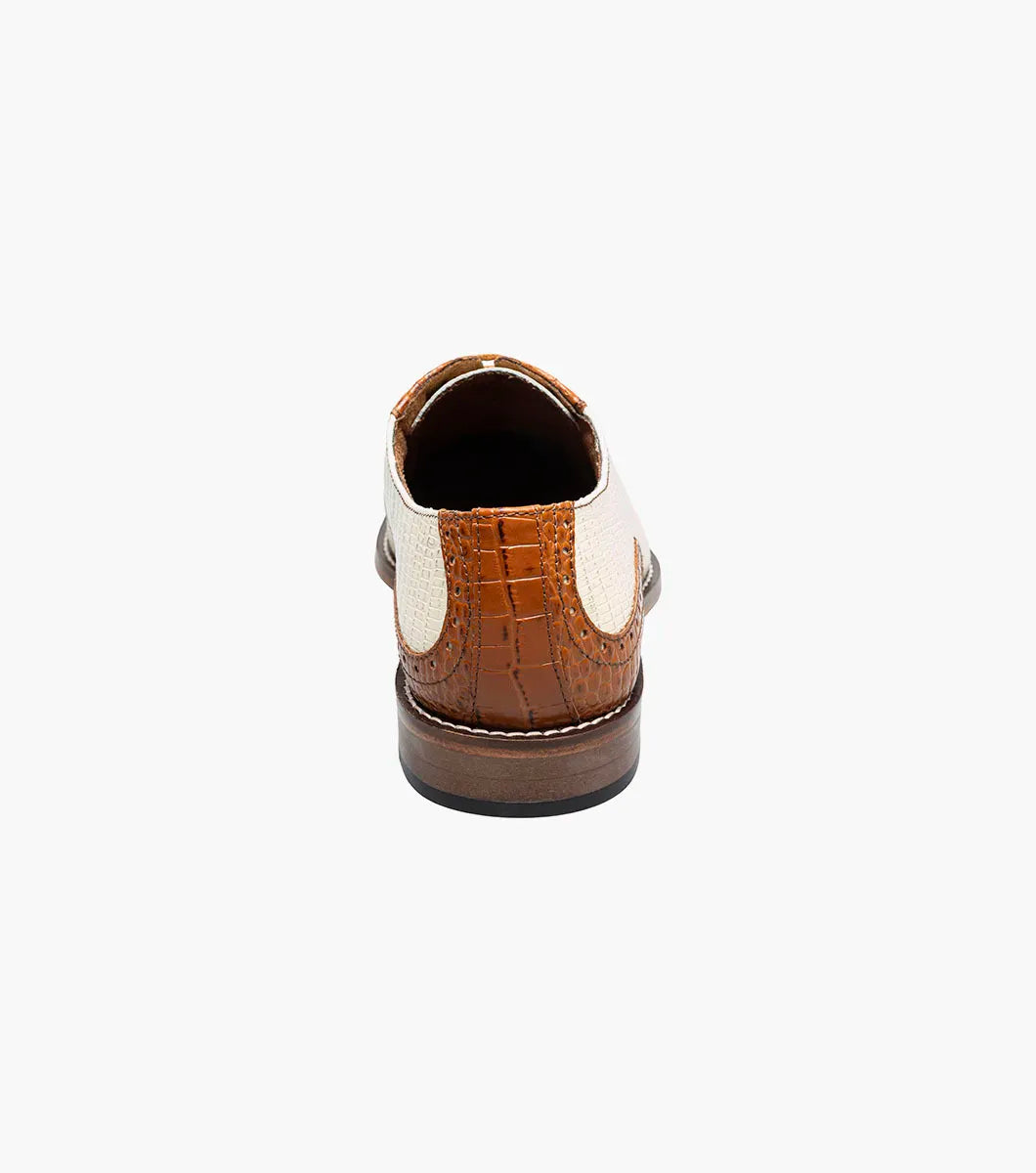 The STACY ADAMS Tarango Modified Cap Toe Oxford in Tan Multi (25770-238) blends tan leather and cream fabric with a closed lace design and low wooden heel—an ideal formal shoe for stylish men.