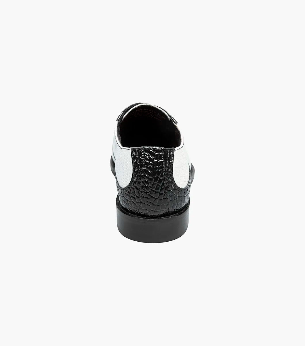The STACY ADAMS Tarango Modified Cap Toe Oxford (Black w/White, 25770-111) is a men's lace-up dress shoe in crocodile print leather with a low heel, perfect for an elegant formal look.