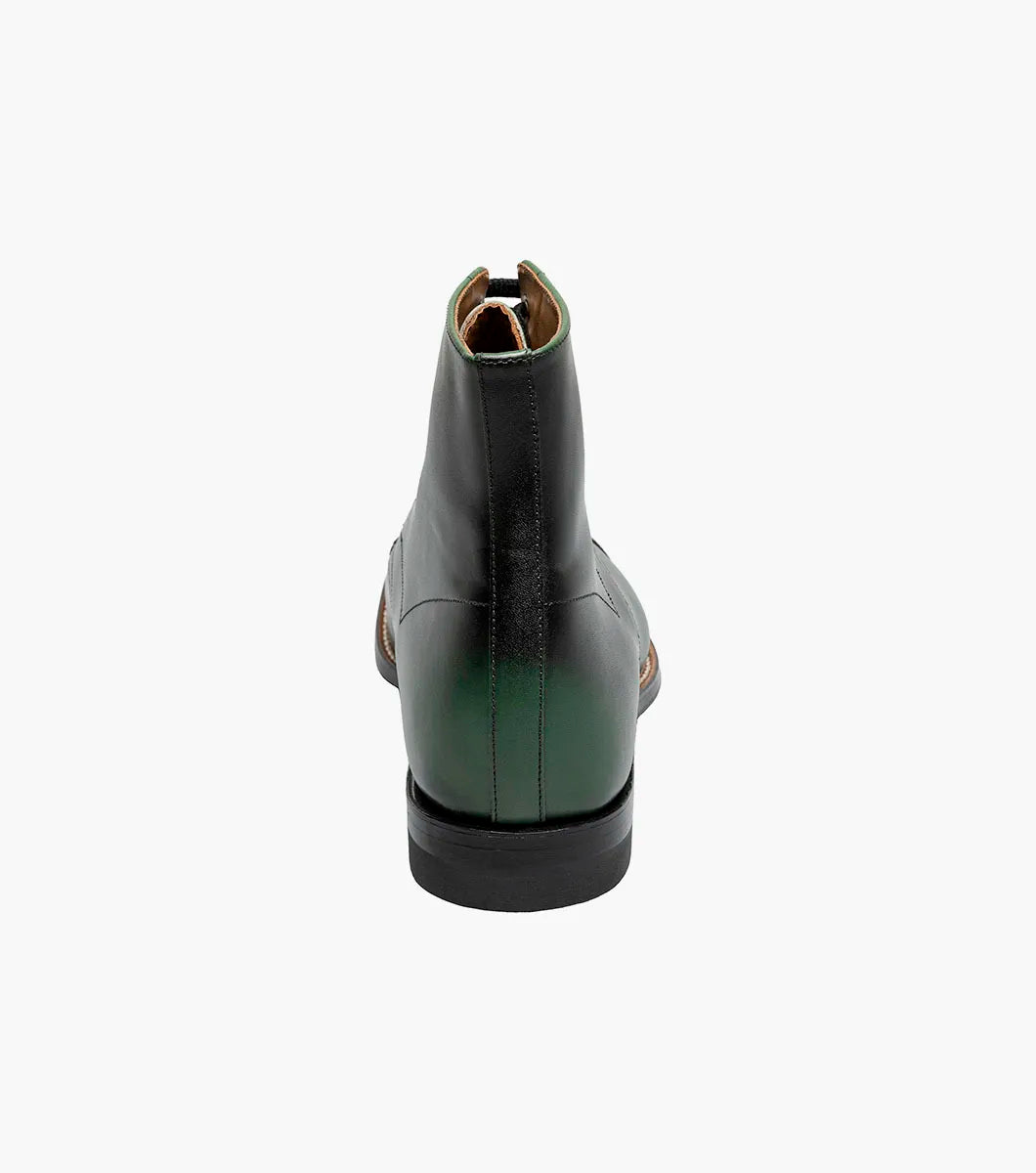 The Stacy Adams Madison Cap Toe Lace Up Boot (00110-300) features a dark green leather upper, black sole, brown welt, and closed lacing—an elegant STACY ADAMS dress boot shown on a white background.