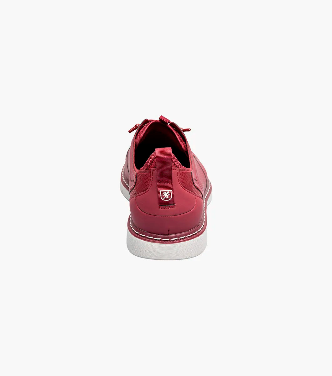 The Stacy Adams Synchro Plain Toe Elastic Lace Up sneaker in Raspberry features perforated detailing, anatomical arch support, and a white sole—shown as a single shoe on a plain white background.