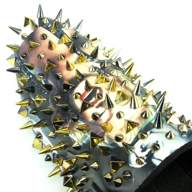 The FI-7239-L Marilyn Gold Spikes by Fiesso is a black slip-on fashion shoe adorned with metallic silver and gold spikes of various sizes and shapes.