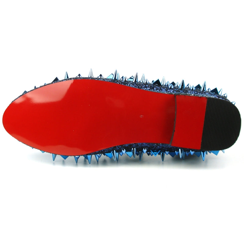 The FI-7239 Navy Glitter Navy Spikes slip-on by Fiesso features dazzling navy glitter and spikes, a bold red interior, and a black sole for a statement-making look.