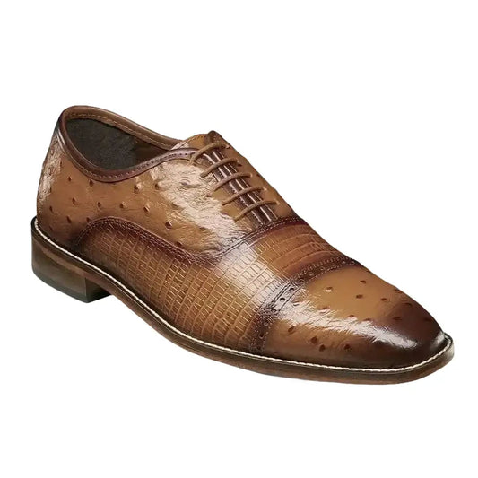 The Stacy Adams Rodano Shoes in tan, by STACY ADAMS, feature a shiny finish, textured pattern, and classic lace-up closure. Displayed on a white background. Please note: FINAL SALE—no exchange or return available.