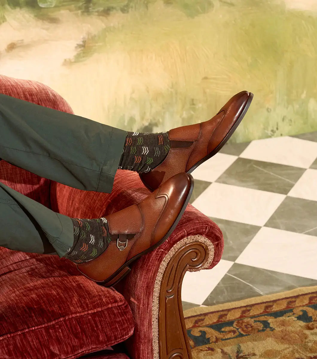 The Stacy Adams Lockwood Wingtip Ornament Slip On in Cognac features classic leather style with a textured upper, single side buckle, and low stacked heel—perfect for men seeking timeless dress shoes.