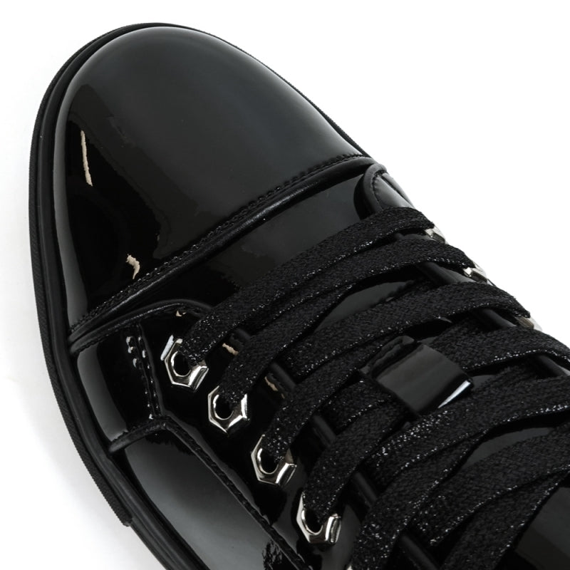 The FI-2415-2 Black Patent Lace up Low Cut Leather Sneakers by Fiesso feature glossy black patent leather, black laces, and metal eyelets on a white background, along with a cushioned insole for enhanced comfort.