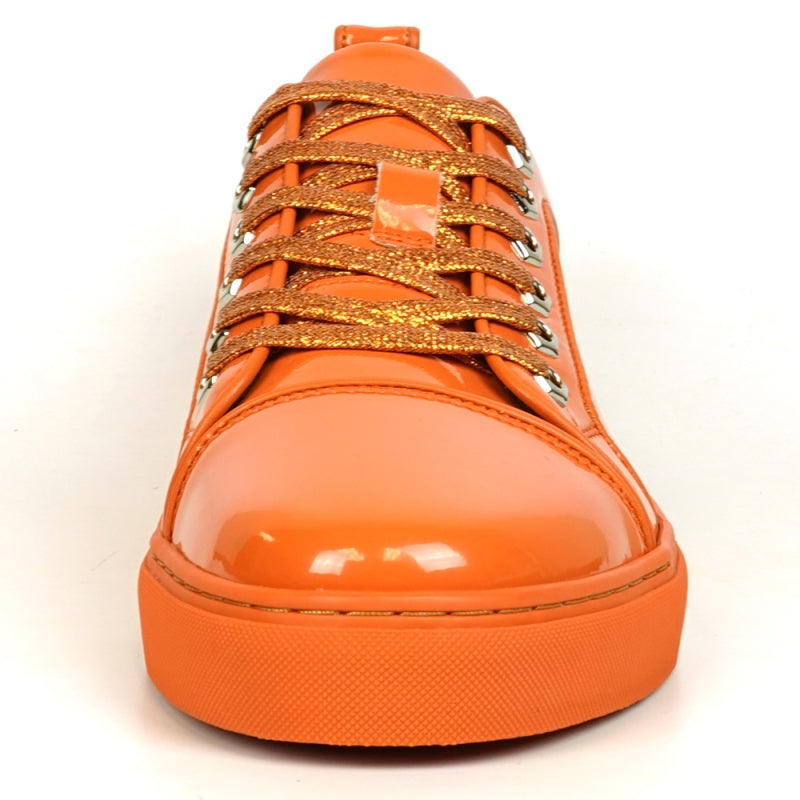 The Fiesso FI-2415-2 Orange Patent Lace-up Low-Cut Leather Sneaker boasts shiny orange patent leather and matching laces, designed for men's casual wear. Set against a crisp white backdrop, these sneakers stylishly blend comfort and trendiness.