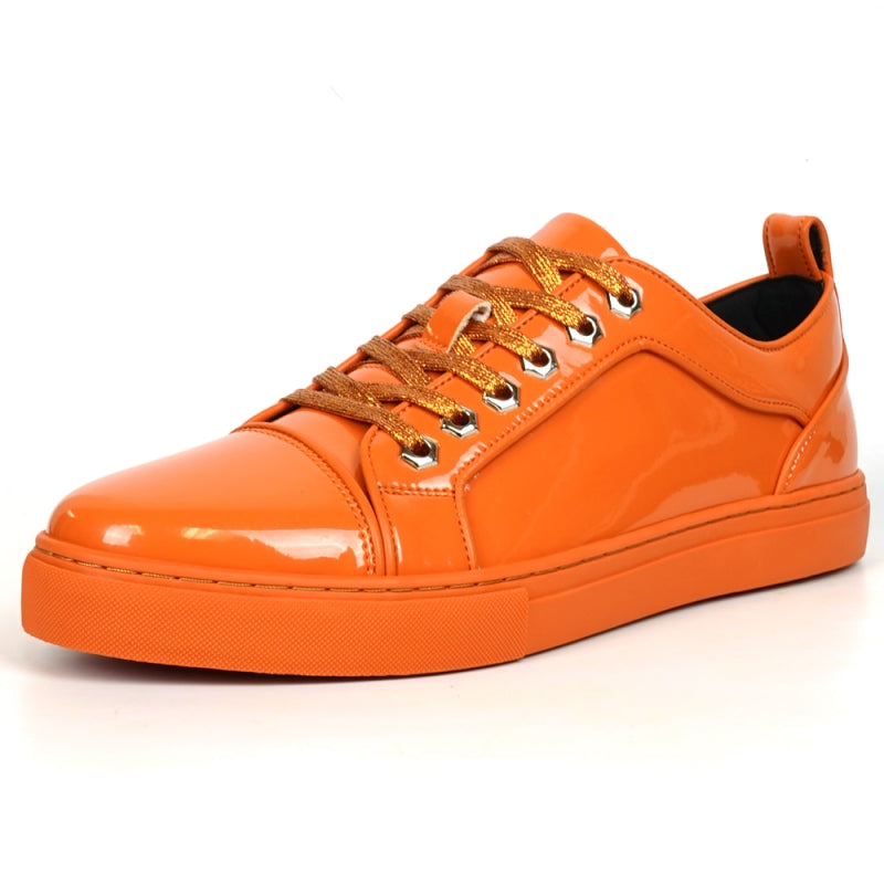 The Fiesso FI-2415-2 Orange Patent Lace-up Low-Cut Leather Sneaker boasts shiny orange patent leather and matching laces, designed for men's casual wear. Set against a crisp white backdrop, these sneakers stylishly blend comfort and trendiness.