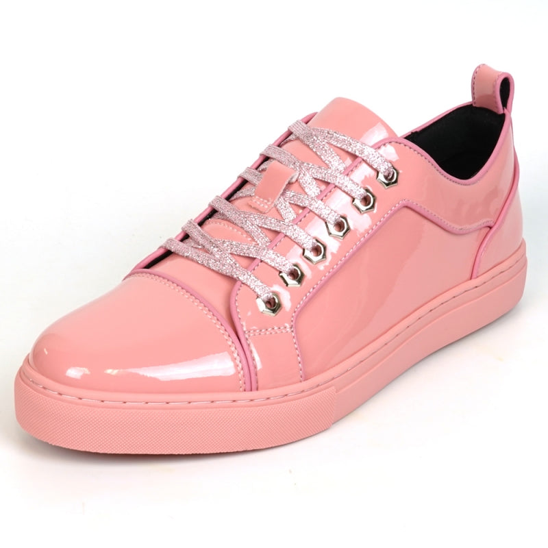 Close-up of the Fiesso FI-2415-2 sneaker in shiny pink patent leather, featuring sparkly pink laces, metallic eyelets, and a cushioned insole for ultimate comfort.