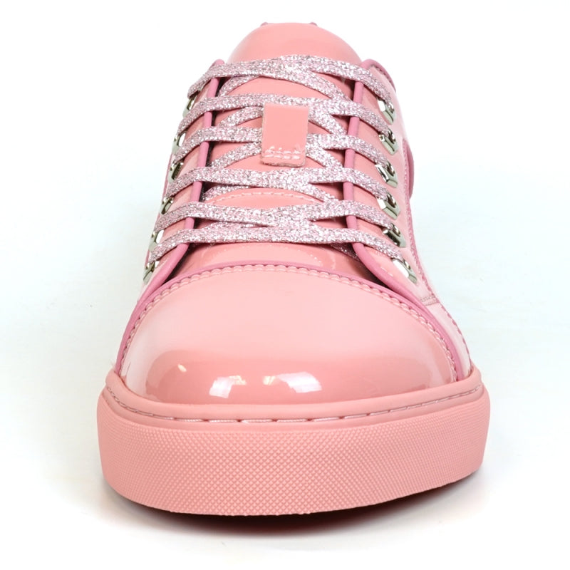 Close-up of the Fiesso FI-2415-2 sneaker in shiny pink patent leather, featuring sparkly pink laces, metallic eyelets, and a cushioned insole for ultimate comfort.