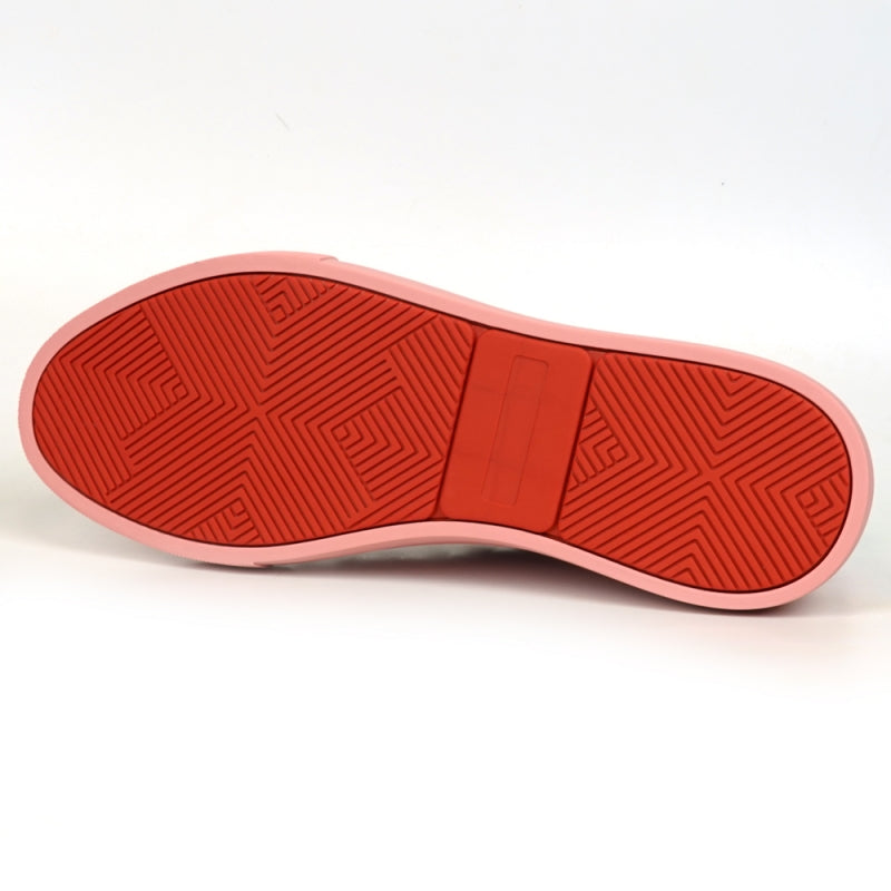 Close-up of the Fiesso FI-2415-2 sneaker in shiny pink patent leather, featuring sparkly pink laces, metallic eyelets, and a cushioned insole for ultimate comfort.