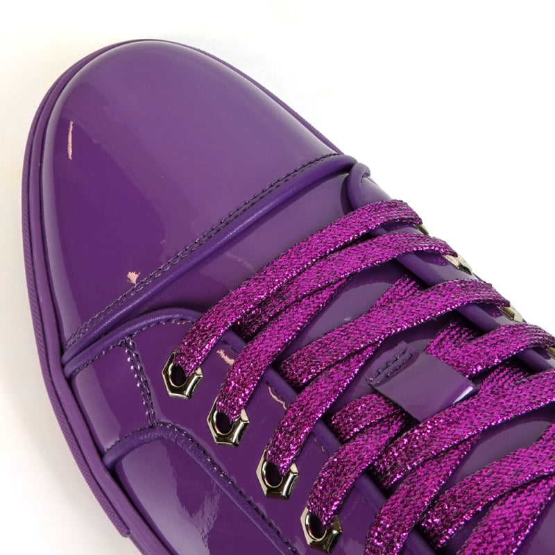 Close-up of Fiesso's FI-2415-2 Purple Patent Lace up Low Cut Leather Sneaker, featuring glossy patent leather, glittery laces, and metal eyelets for comfortable men's casual wear.
