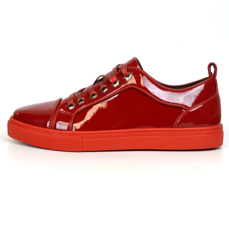 Fiesso's FI-2415-2 Red Patent Lace-up Low Cut Leather Sneaker is striking with its red patent finish, vibrant laces, bold rubber sole, and a glitter upper that adds a glamorous touch—perfect for those seeking style and flair.