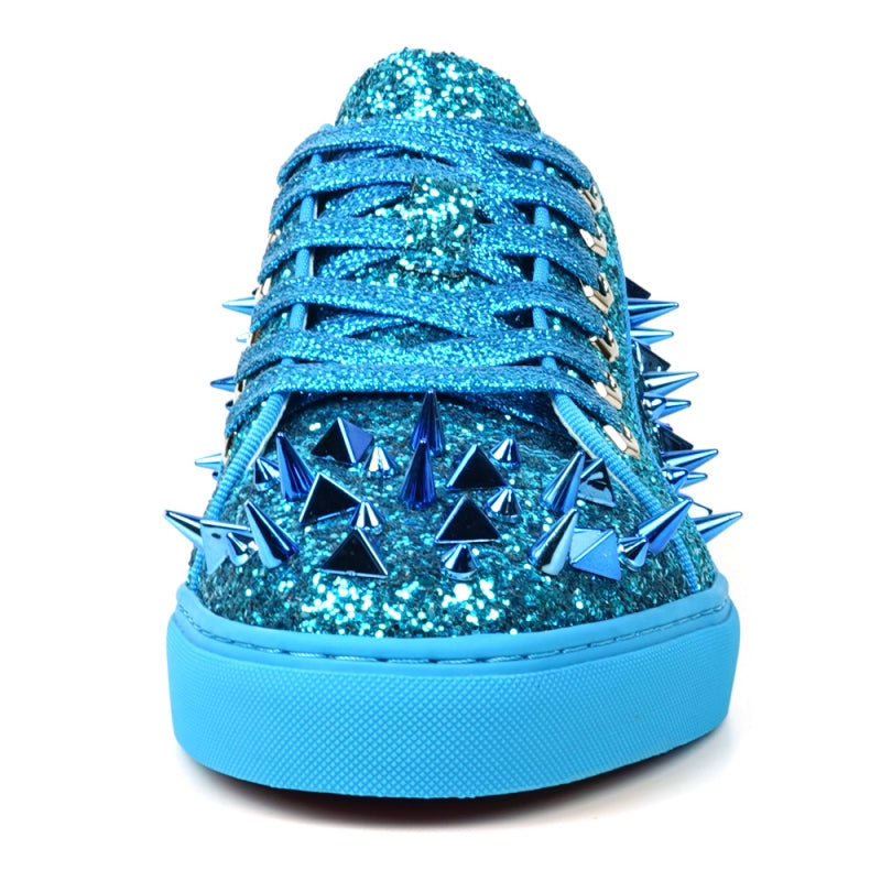 Introducing the FI-2429 Blue Glitter Blue Spikes Low Cut Sneaker Encore by Fiesso, featuring a stunning blue glitter exterior with metallic spikes, complemented by blue laces and a sleek blue sole. This bold design uniquely twists traditional men's dress shoes.