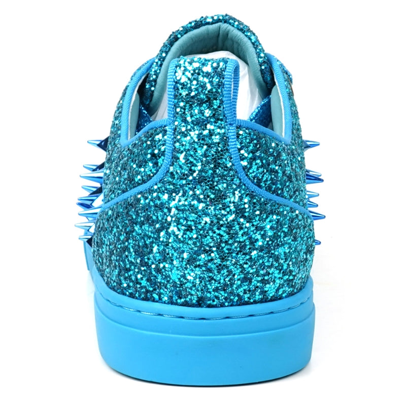 Introducing the FI-2429 Blue Glitter Blue Spikes Low Cut Sneaker Encore by Fiesso, featuring a stunning blue glitter exterior with metallic spikes, complemented by blue laces and a sleek blue sole. This bold design uniquely twists traditional men's dress shoes.