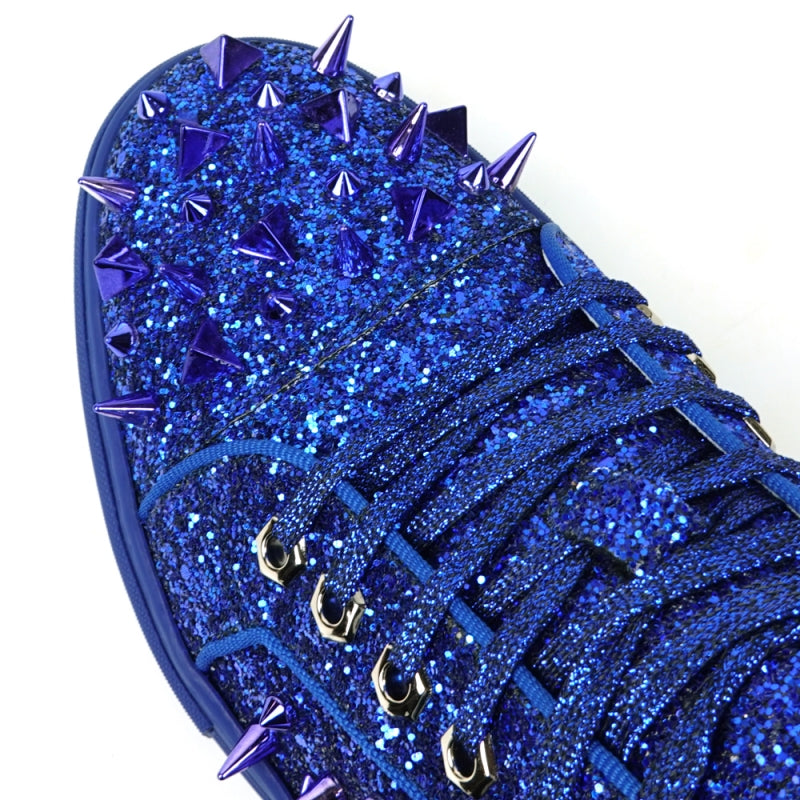 The FI-2429 Navy Glitter Navy Spikes Low Cut Sneaker by Fiesso stuns with dazzling glitter and striking metallic spikes.