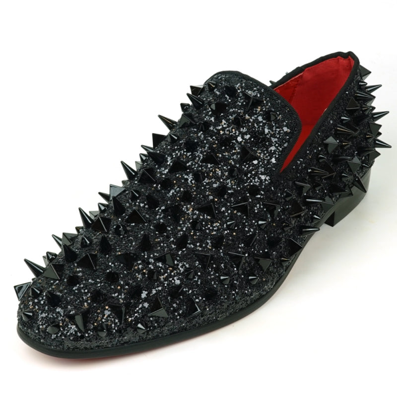 The FI-7517 Black Glitter Black Spikes Slip On Loafer by Fiesso is a striking masterpiece, adorned with black spikes and glitter, featuring a luxurious red interior lining. This exquisite shoe boasts a leather upper that promises both elegance and durability.