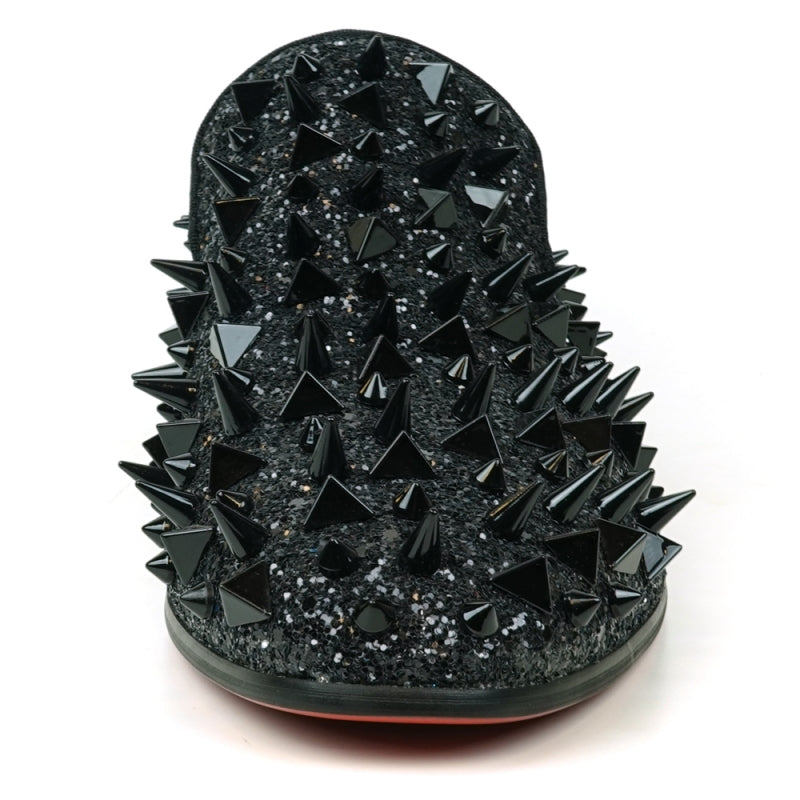 The FI-7517 Black Glitter Black Spikes Slip On Loafer by Fiesso is a striking masterpiece, adorned with black spikes and glitter, featuring a luxurious red interior lining. This exquisite shoe boasts a leather upper that promises both elegance and durability.