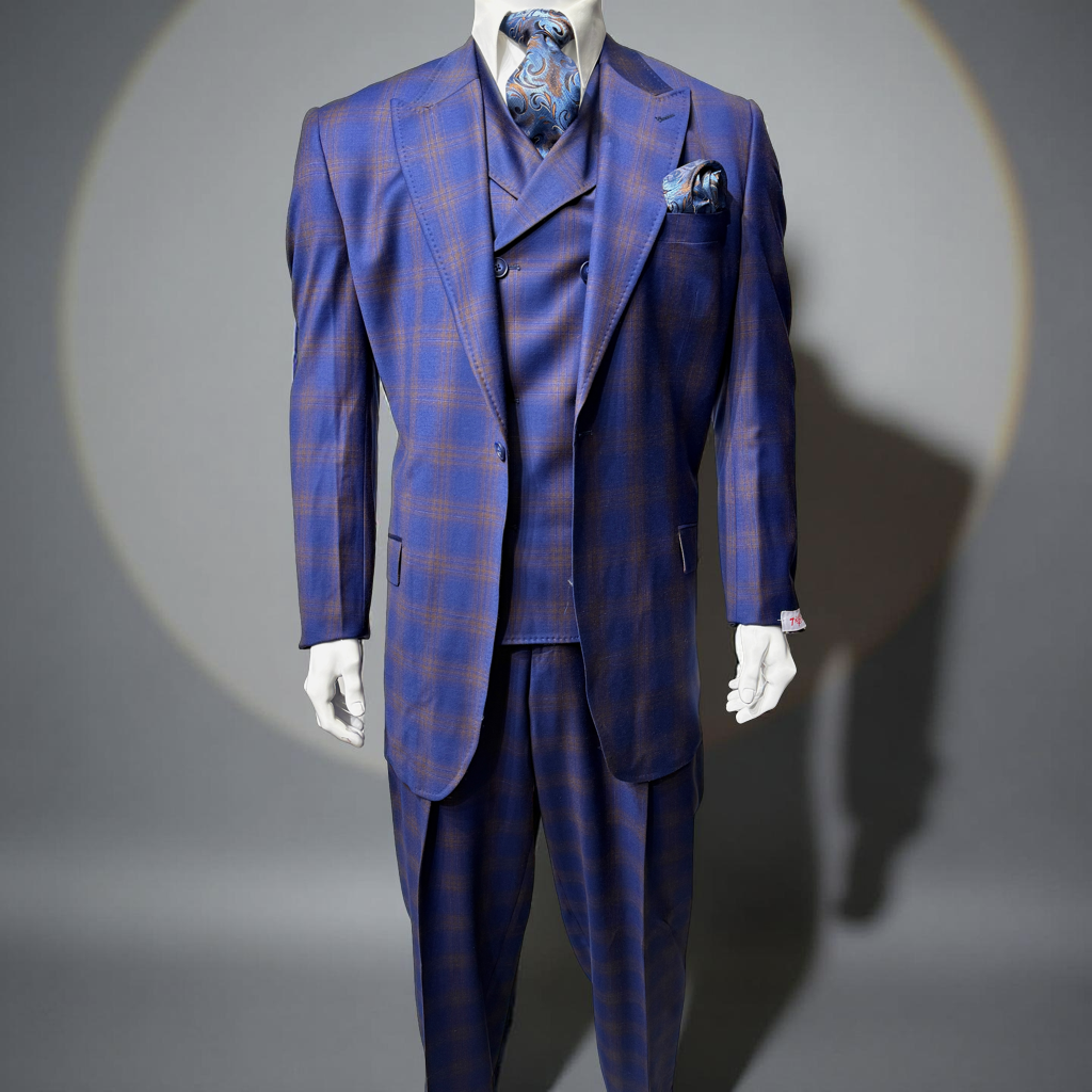 A mannequin showcases the Tiglio Rosso San Giovesse Blue Rust Wide Leg suit (TL8302), featuring blue and rust plaid, matching vest, patterned tie, and pocket square by Tiglio Rosso, set against a neutral background.