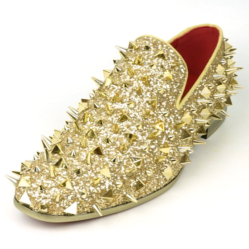 The FI-7517 Gold Glitter Slip on Loafer by Fiesso features a pony hair upper with sharp conical gold spikes and a red inner lining.