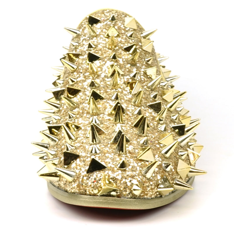 The FI-7517 Gold Glitter Slip on Loafer by Fiesso features a pony hair upper with sharp conical gold spikes and a red inner lining.