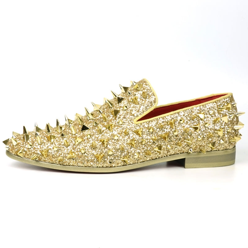 The FI-7517 Gold Glitter Slip on Loafer by Fiesso features a pony hair upper with sharp conical gold spikes and a red inner lining.
