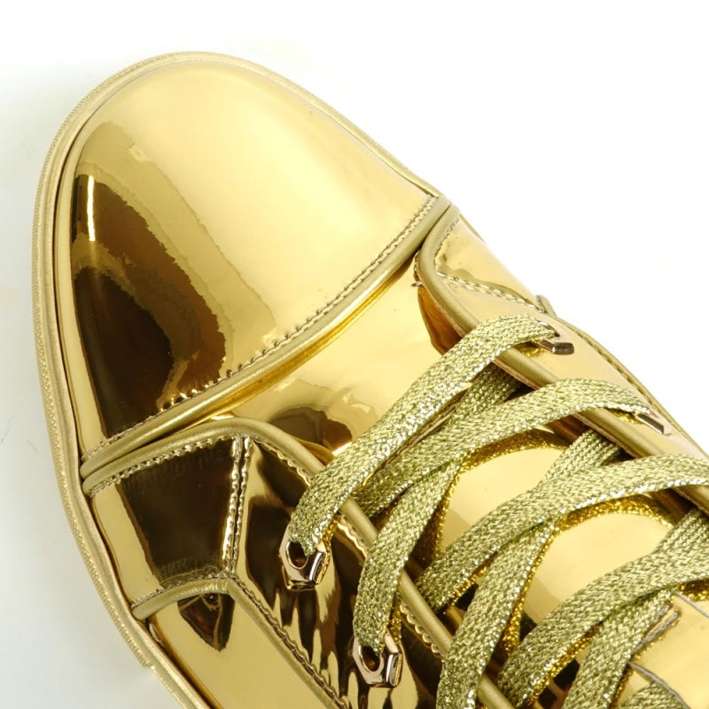 The Fiesso FI-2416-2 Gold Patent Leather High Top Sneaker for men features shiny gold patent leather, gold laces, and a light rubber sole, stylishly displayed from a side view.