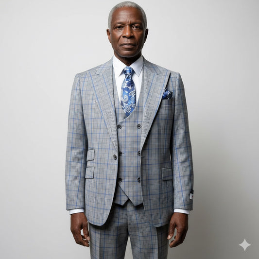 A mannequin displays a Tiglio Rosso Orvietto Grey/Blue Plaid TL6350 suit, paired with a blue paisley tie and pocket square. Made from 100% wool, the ensemble stands elegantly against a dark blue background.