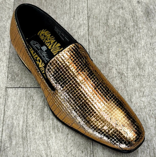 An Exclusive Formal Dress Shoe Gold 6882 from UNIQUE DESIGN MENSWEAR, featuring a shiny metallic slip-on crafted from genuine leather with a crocodile texture design, rests elegantly on a gray tiled floor.