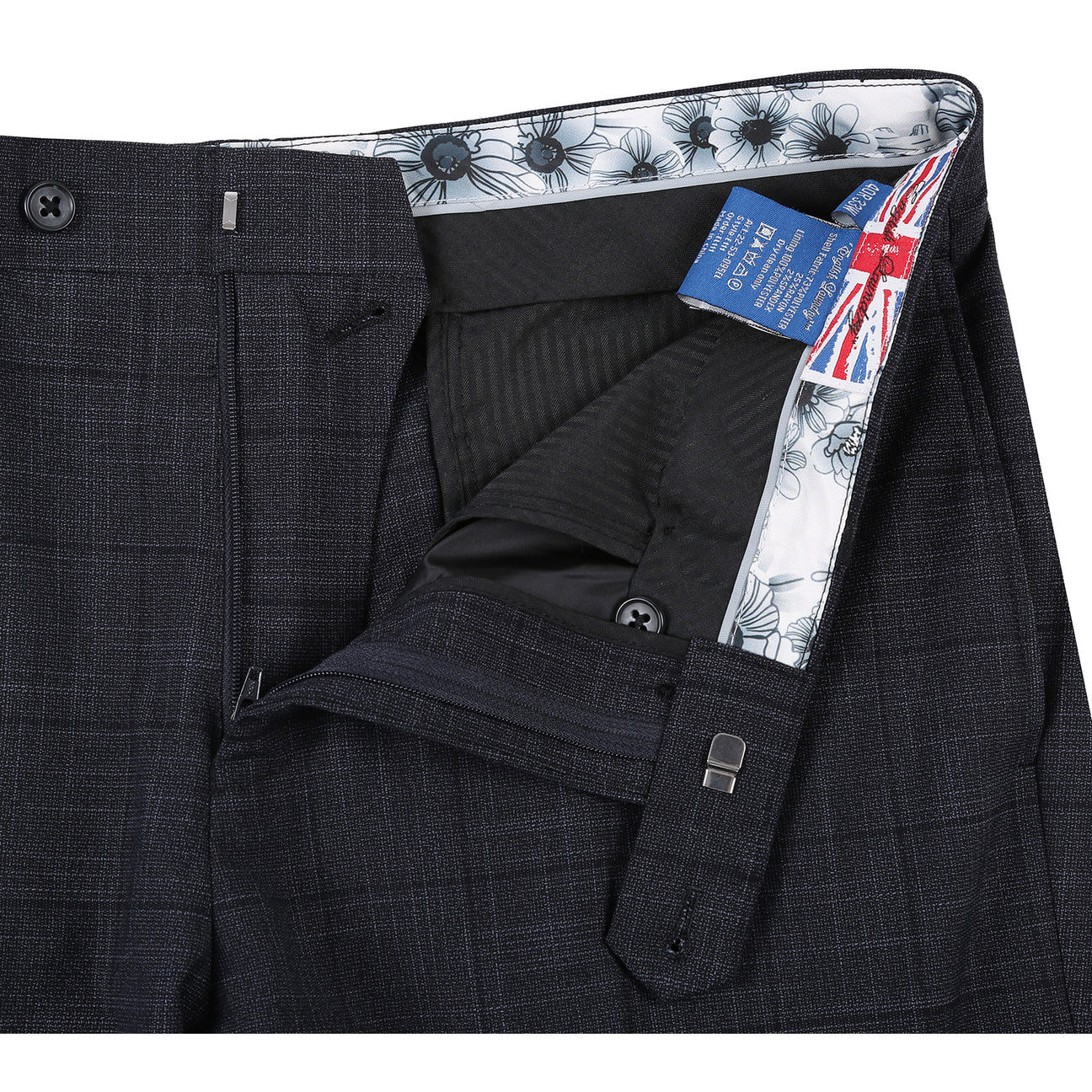 The ENGLISH LAUNDRY Dark Gray Check Suit 22-53-095EL by English Laundry features a slim fit jacket with notch lapels, shown over a white dress shirt and red polka dot tie on a mannequin.